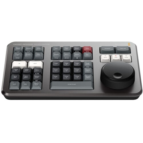 The DaVinci Resolve Speed Editor makes editing faster and easier with a tactile dial, source tape, live trimming, with wireless or USB connection.