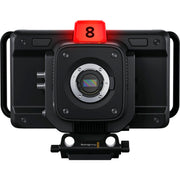 Blackmagic Design Studio Camera 4K Plus G2 with MFT lens mount, 4K UHD 3840x2160 sensor, 25,600 ISO, 12G-SDI and HDMI outputs, 7" LCD viewfinder with sunshade, Blackmagic RAW recording, and built-in DaVinci Resolve colour correction.