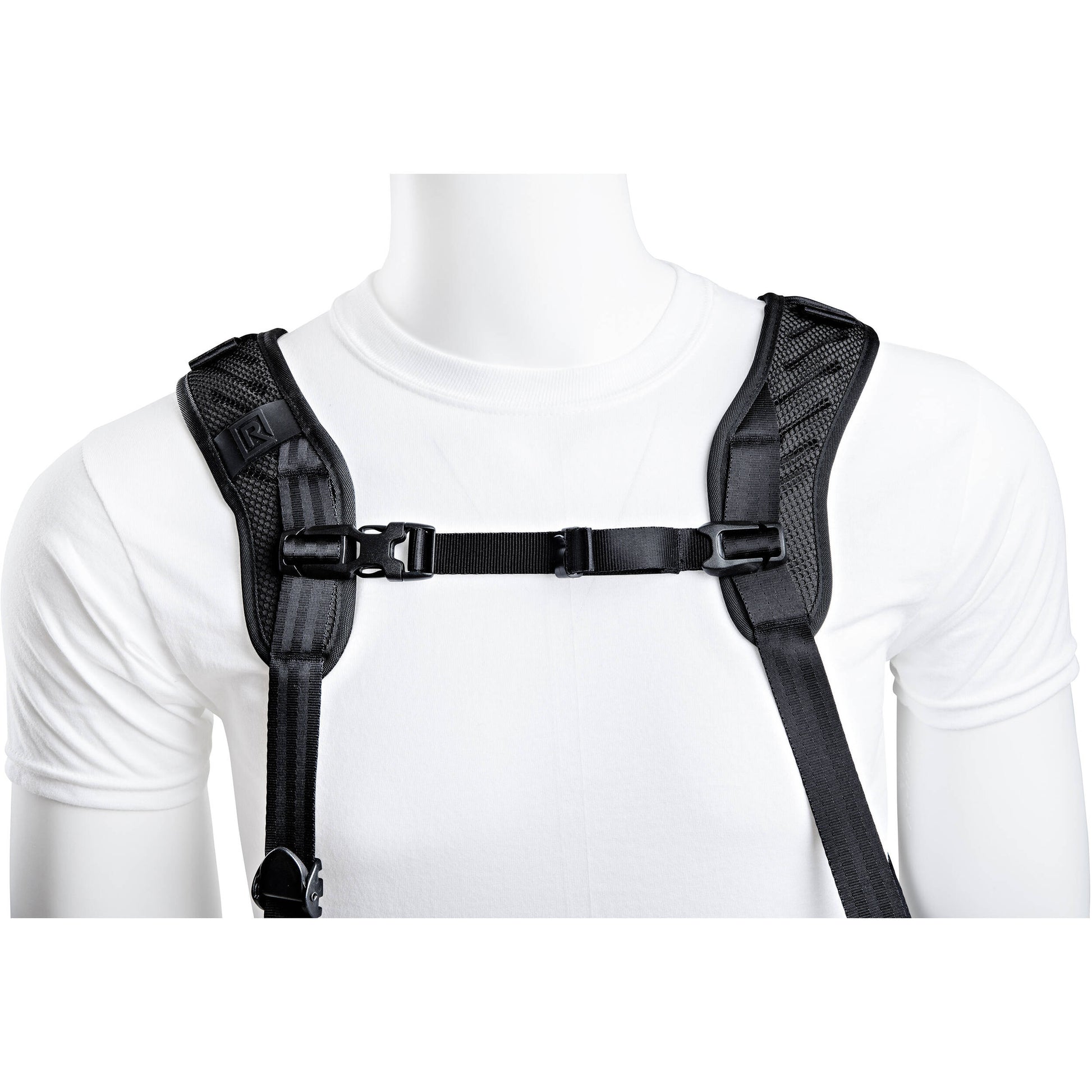 Black shoulder harness on a mannequin with a white background
