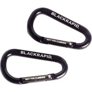 Two black carabiners with 'BLACKRAPID.' branding on a white background
