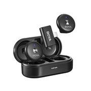 Boya Omic-D Ultra-compact Wireless Mic (Lightning) with 2.4GHz wireless, iOS Lightning receiver, 5+ hours battery life (15 hours with charging case), noise cancellation, 50m range, and USB-C charging case with wireless charging.
