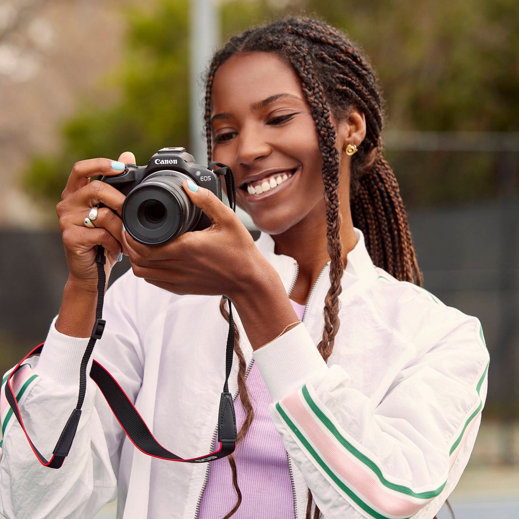 Canon EOS R50 with RF-S 18-45mm lens for travel.
