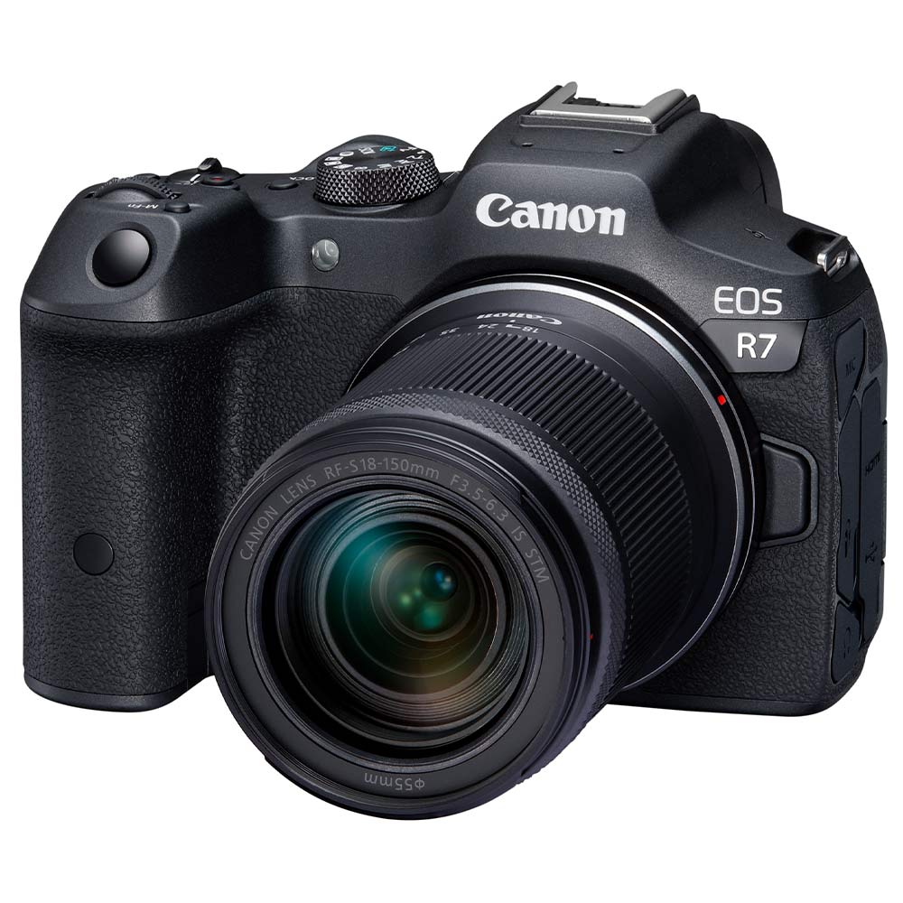Canon EOS R7 Mirrorless Camera + RF-S 18-150mm Lens: 32.5MP APS-C sensor, DIGIC X processor, 4K 60p video (7K oversampled), 30fps burst, 7-stop IBIS, Dual Pixel CMOS AF II with AI tracking, RF-S 18-150mm f/3.5-6.3 IS STM lens with 4.5-stop stabilization included.