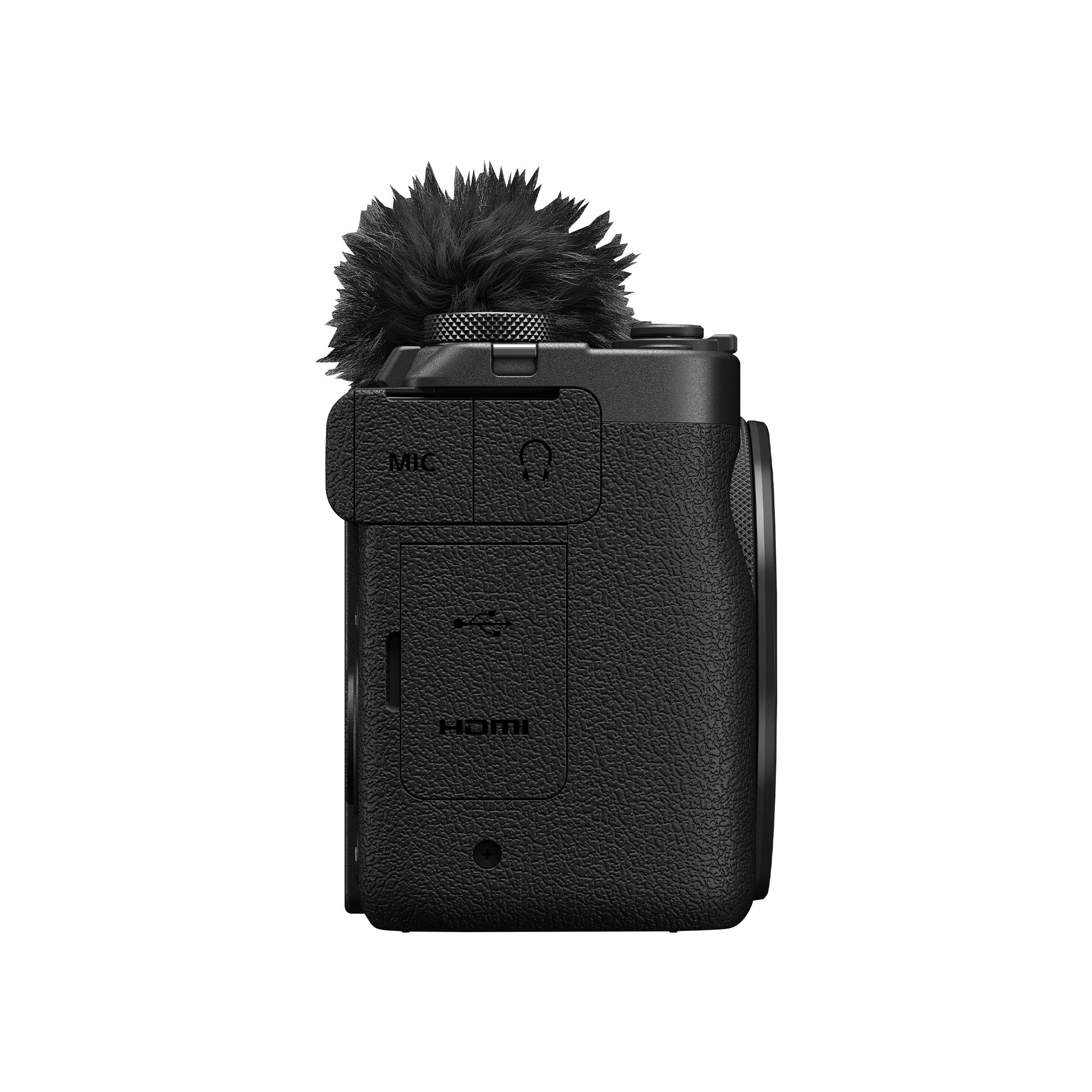 Canon PowerShot V1 Premium Vlogger Kit: 22MP 1.4" CMOS sensor, 16-50mm f/2.8-4.5 lens, 4K 30p full-width and 4K 60p (1.4x crop) video, Dual Pixel CMOS AF II, built-in cooling fan, 3" vari-angle touchscreen, Canon Log 3, built-in ND filter, mic input, headphone output, Wi-Fi, USB-C, 32GB SD card, tripod grip, and windscreen included.