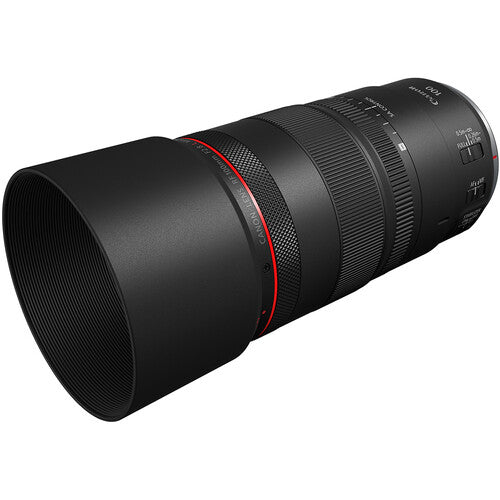 Camera lens with black and red design on a white background