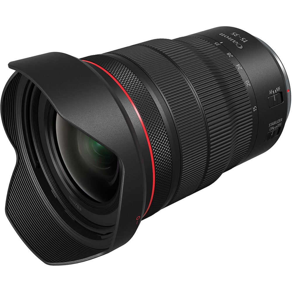 Camera lens with black and red design on a white background