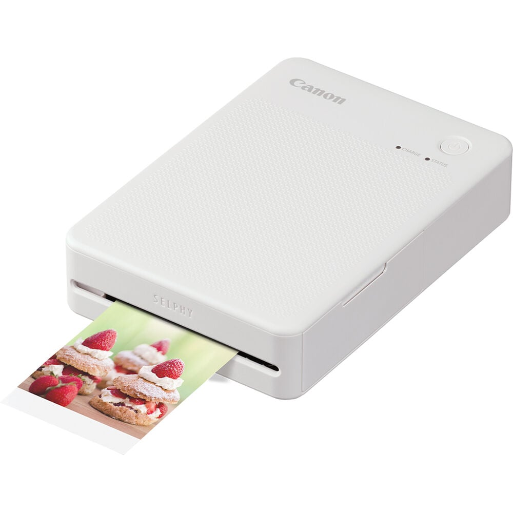 Canon SELPHY Square QX20 portable photo printer in white – compact rectangular device with USB-C port and photo output slot.