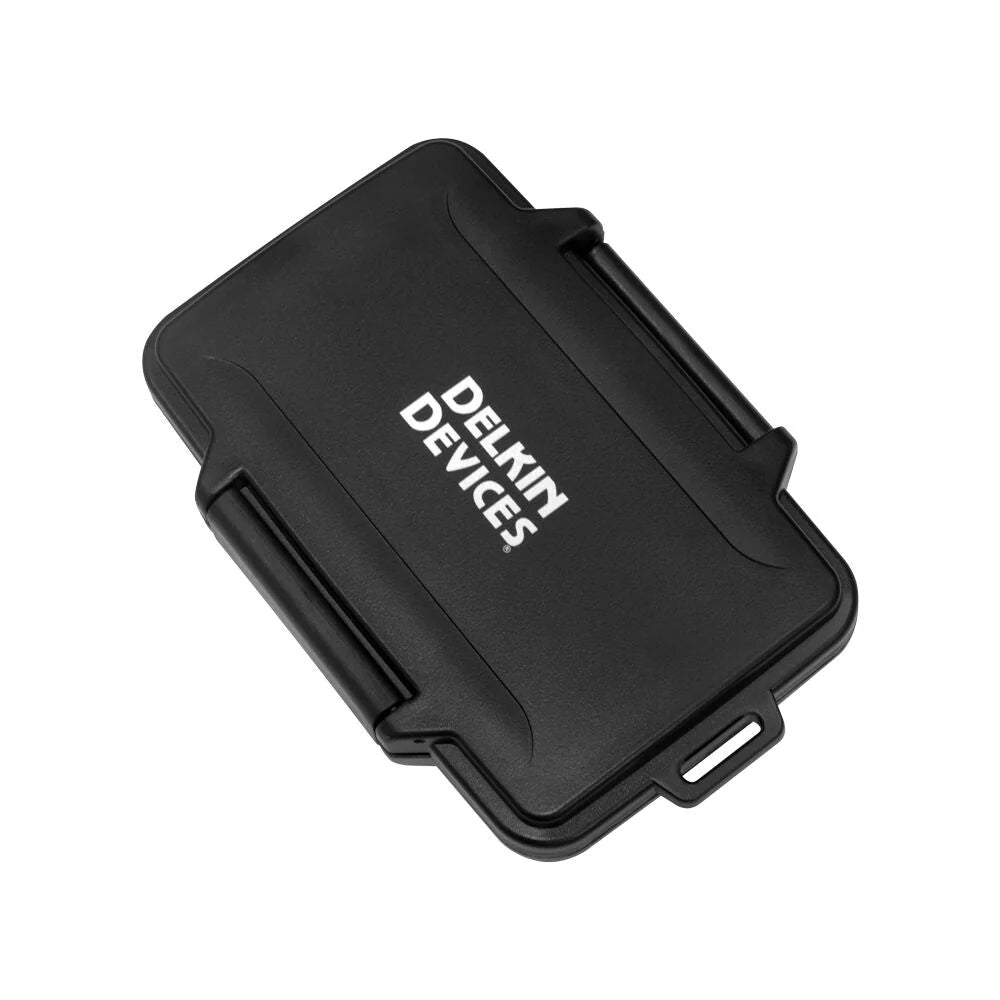 Delkin Devices rugged memory card tote for CFexpress, SD, and microSD cards; weather-resistant, crushproof, and compact.