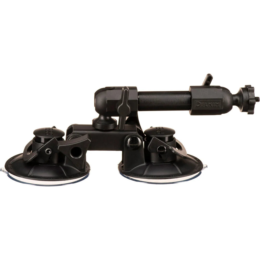 Delkin Devices Fat Gecko Dual-Suction Camera Mount, featuring two ~7 cm industrial-grade suction cups connected to a central adjustable arm with multiple locking joints, topped by a ¼-20 mounting screw and 360° ball-head for versatile camera positioning.