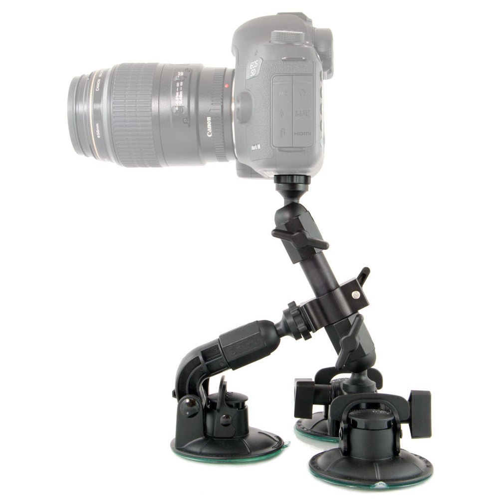 Delkin Devices Fat Gecko Triple Mount featuring three large industrial locking suction cups on a robust adjustable arm, slide-and-lock mechanism, and universal ¼-20 tripod head—designed for secure angled positioning with six adjustment points.