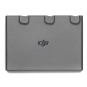 A black DJI Avata 2 Two-Way Charging Hub is shown with a USB-C cable attached.