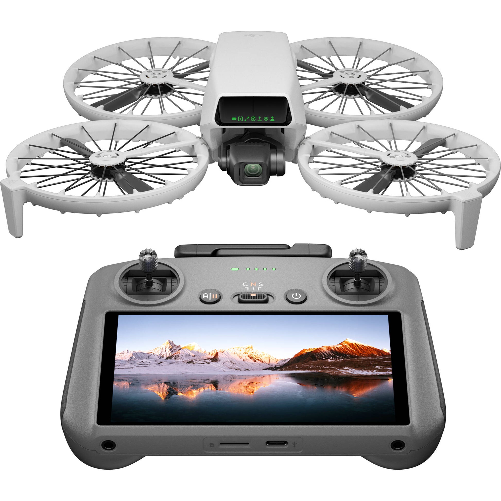 Drone with four propellers and a remote control device on a white background
