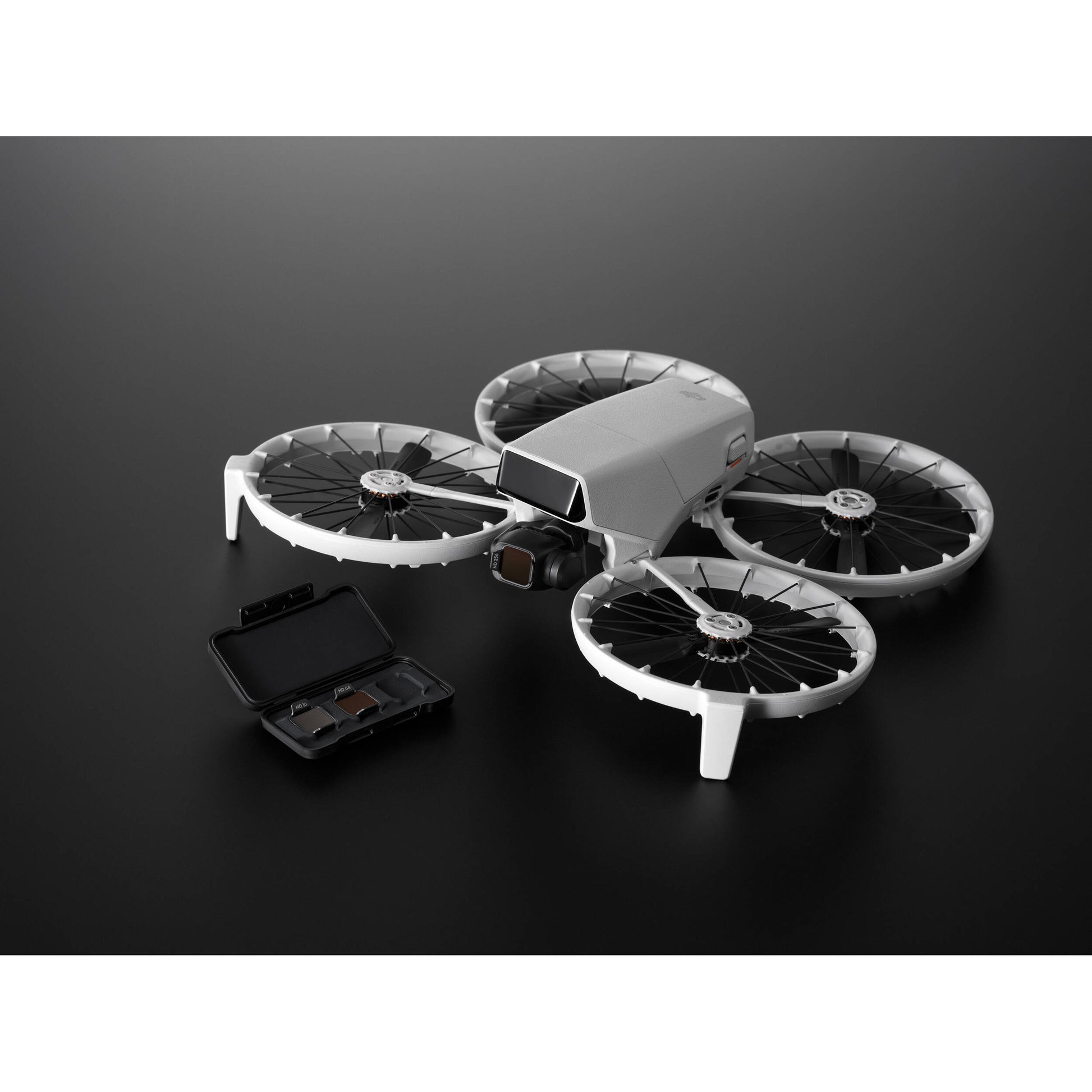 A set of three square DJI Avata 2 ND filters are displayed inside a small, black case.