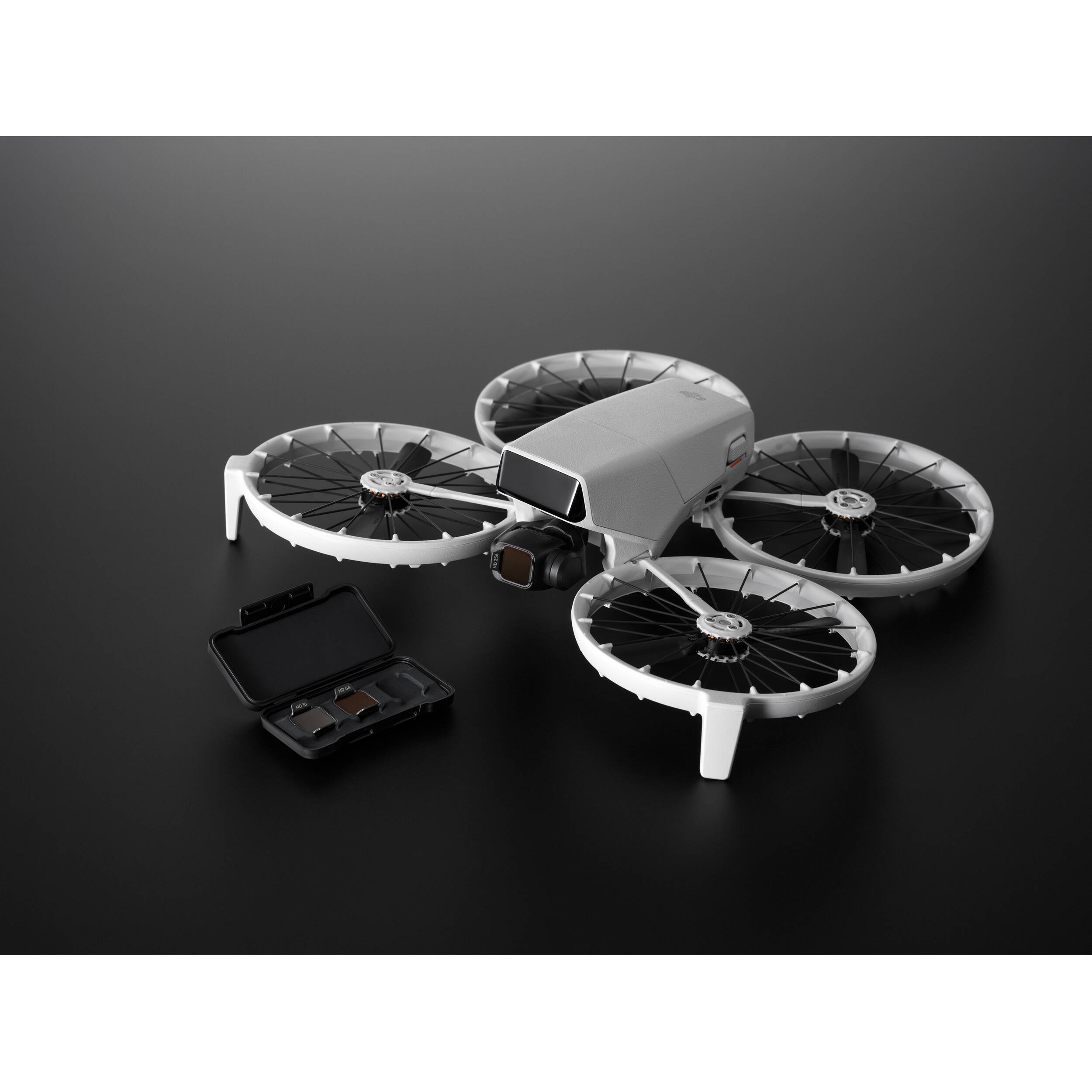 A set of three square DJI Avata 2 ND filters are displayed inside a small, black case.