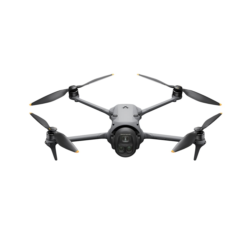 A grey DJI Mavic 4 Pro drone is shown from the front with its four arms extended and its triple-camera system visible