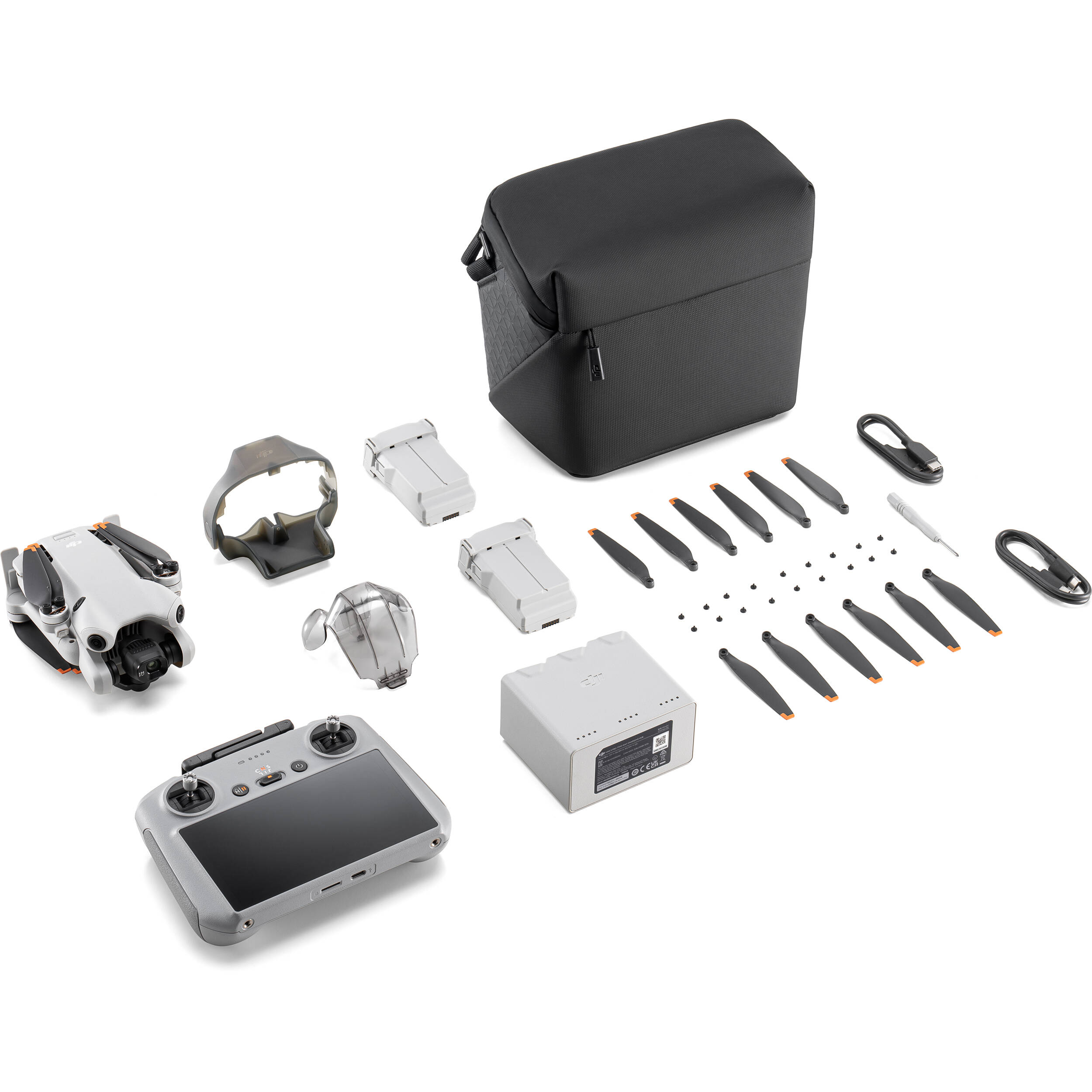 DJI Mini 4 Pro Fly More Combo drone with RC2 controller, featuring a lightweight design under 249g, 4K/60fps HDR video capability, omnidirectional obstacle sensing, and advanced tracking features