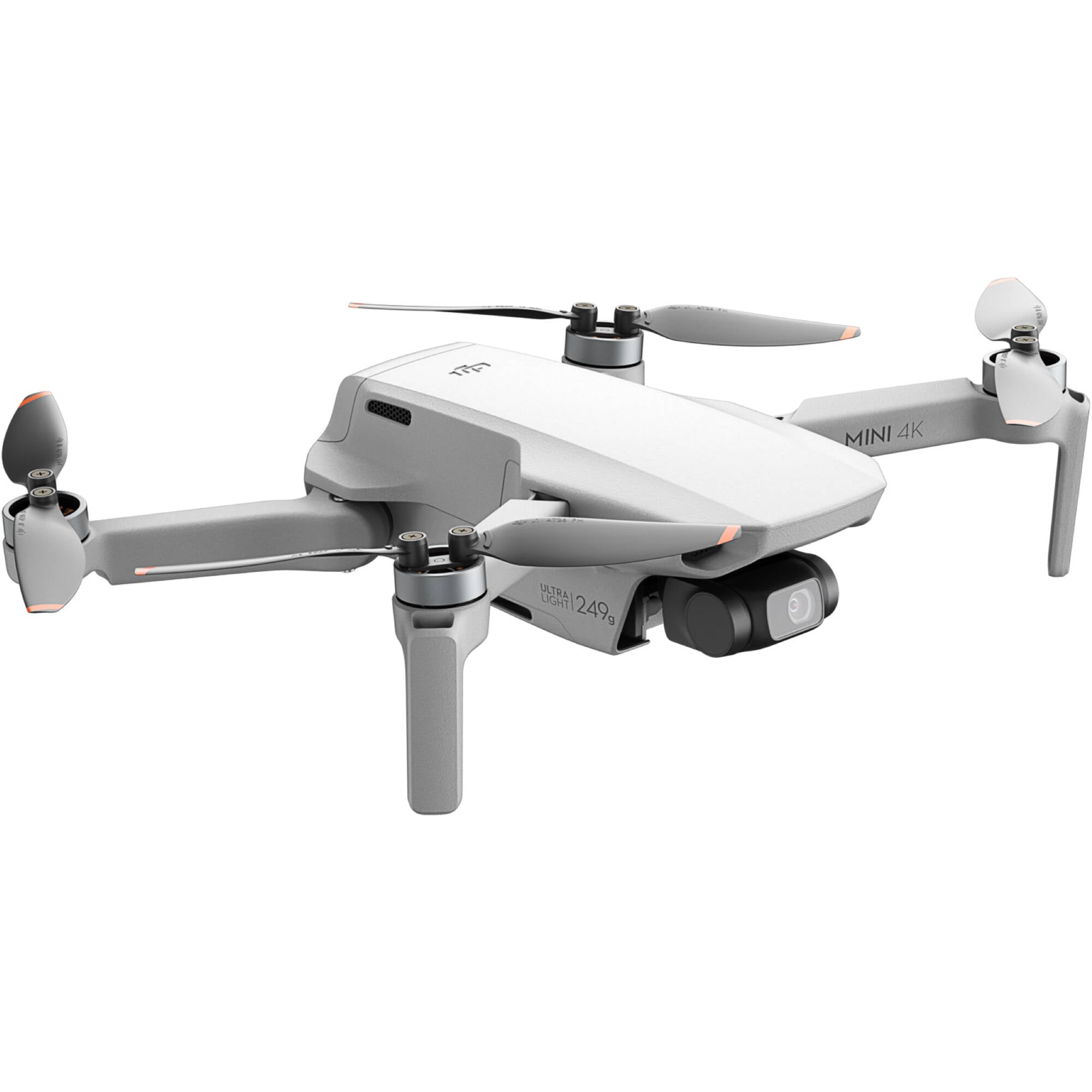 DJI Mini 4 K Fly More Combo — foldable camera drone with controller, three batteries, charging hub, shoulder bag, spare props, and accessories laid out.