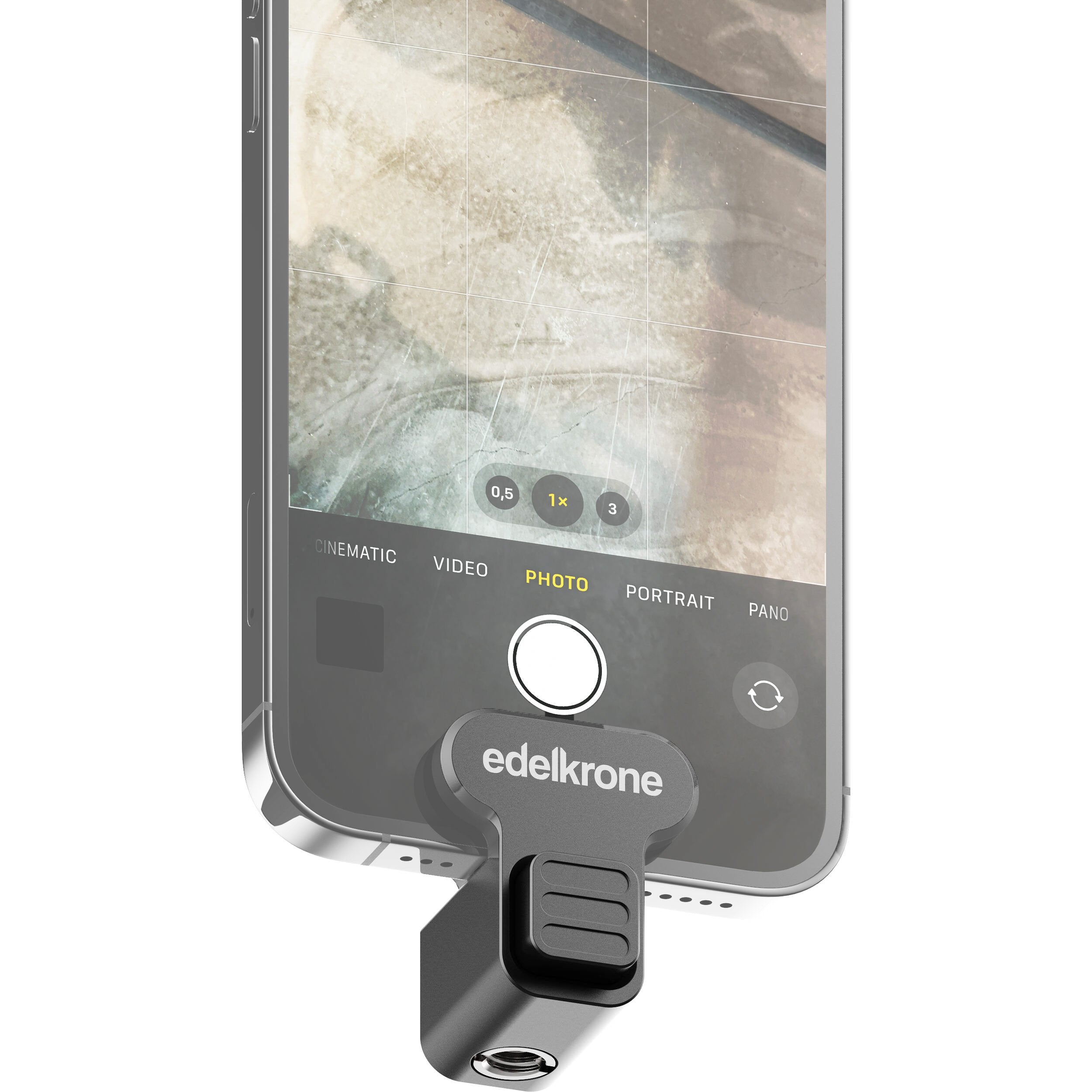 Edelkrone PhoneCLIP Pro smartphone holder – compact CNC-machined aluminum clamp with one-button push operation, anti-slip pads, and ¼″-20 tripod mount.