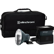 Elinchrom lighting equipment set with flash head and power pack on a white background