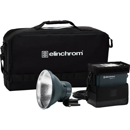 Elinchrom lighting equipment set with flash head and power pack on a white background
