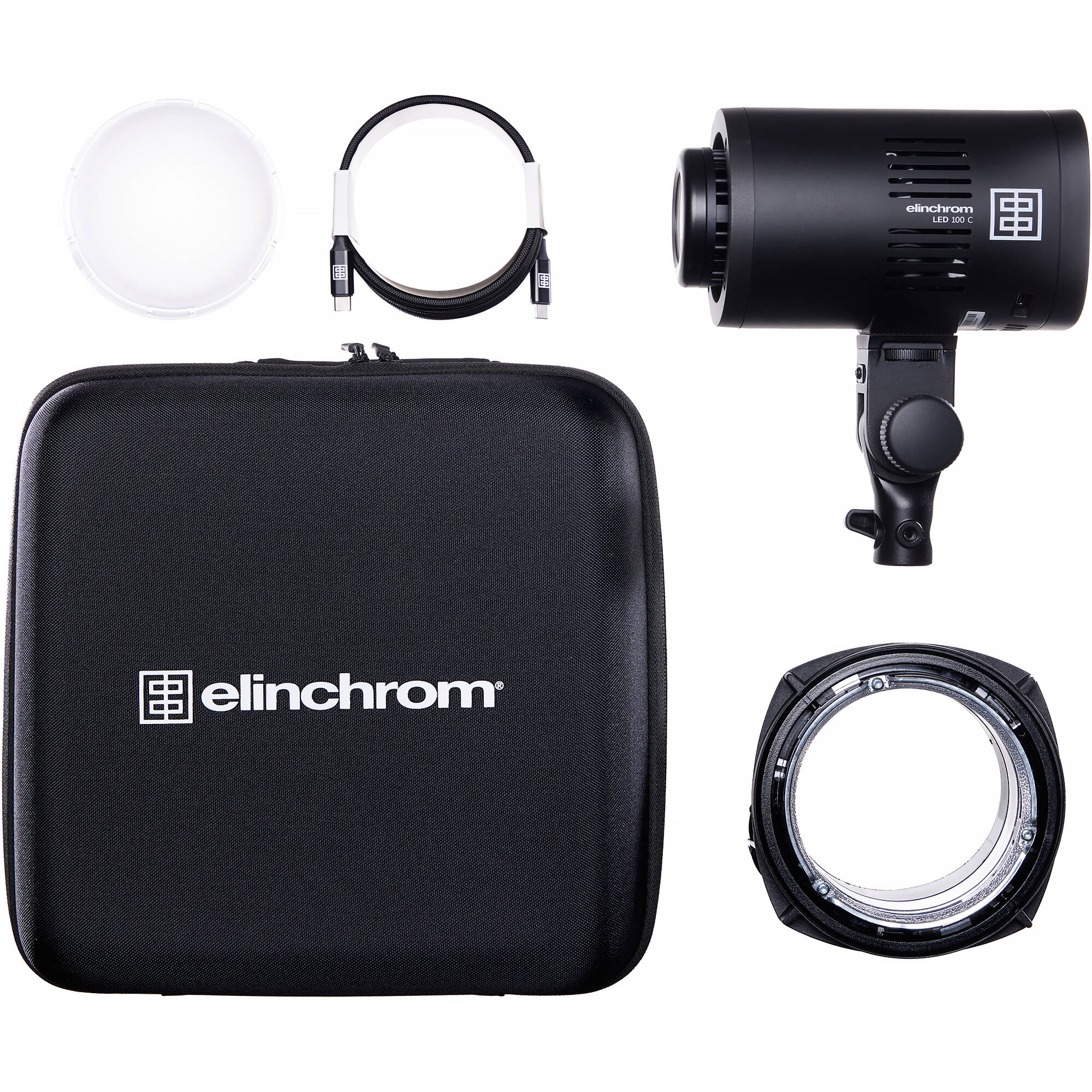 Elinchrom photography light kit with flash unit, softbox, and accessories on a white background