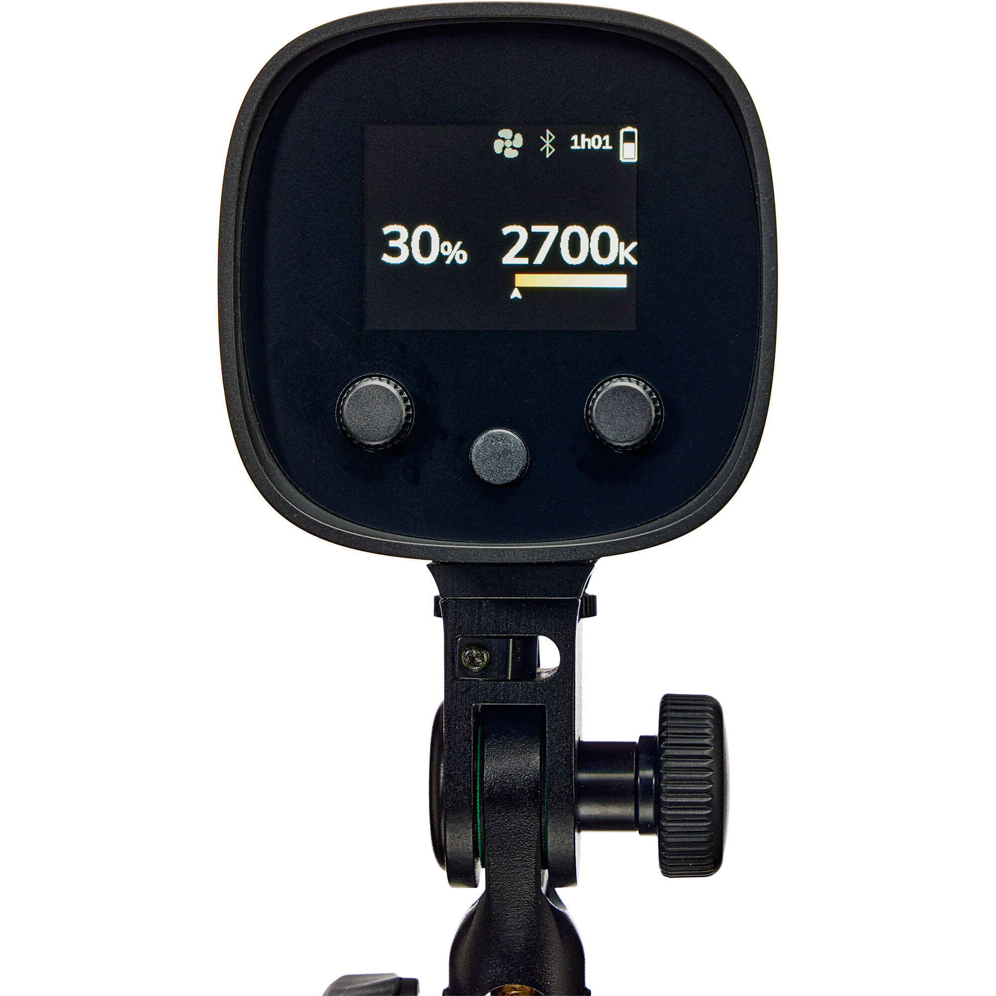 Black light meter with digital display on a white background