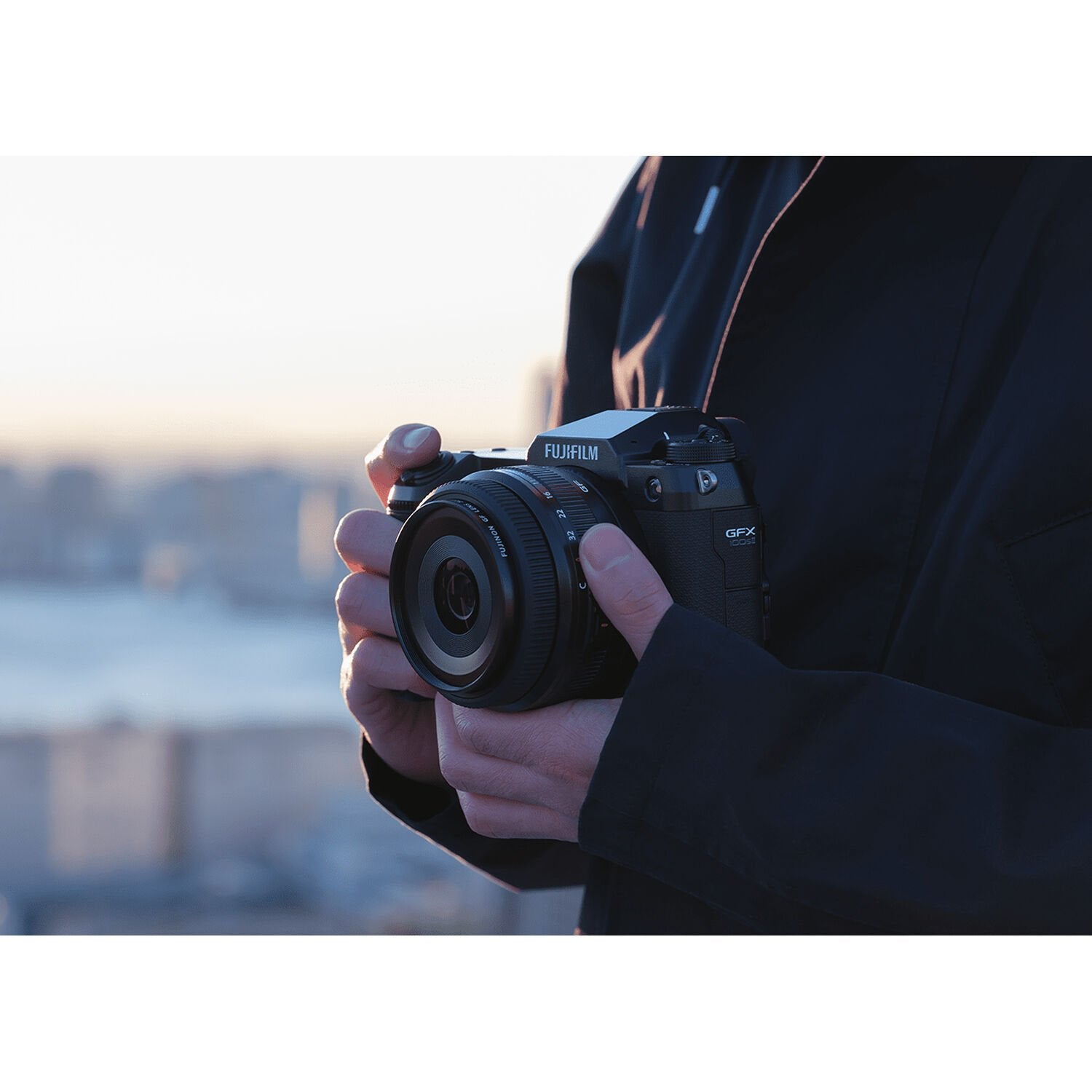 The Fujifilm GFX 100S II Mirrorless Camera is a large format camera with a 102-megapixel CMOS II sensor, featuring 5-axis in-body image stabilization, a continuous burst speed of up to 7 frames-per-second, and an improved AF algorithm with deep-learning AI.