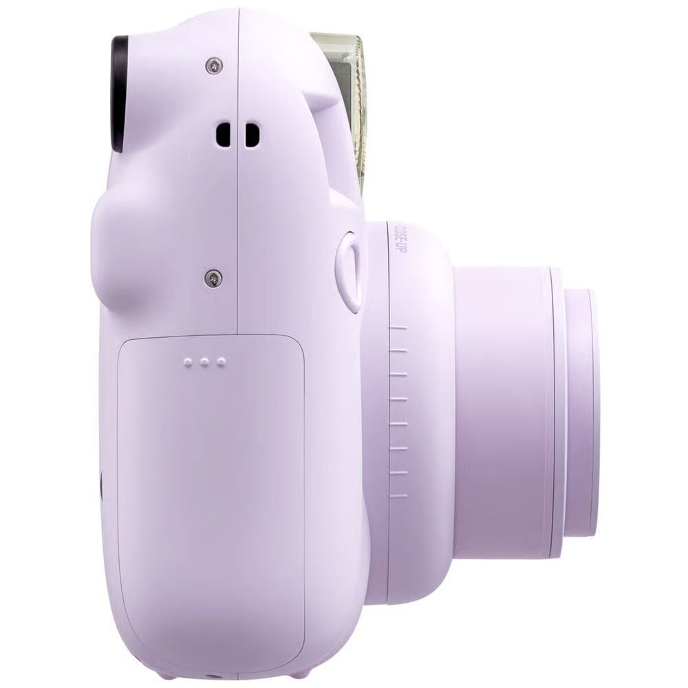 Purple instant camera on a white background