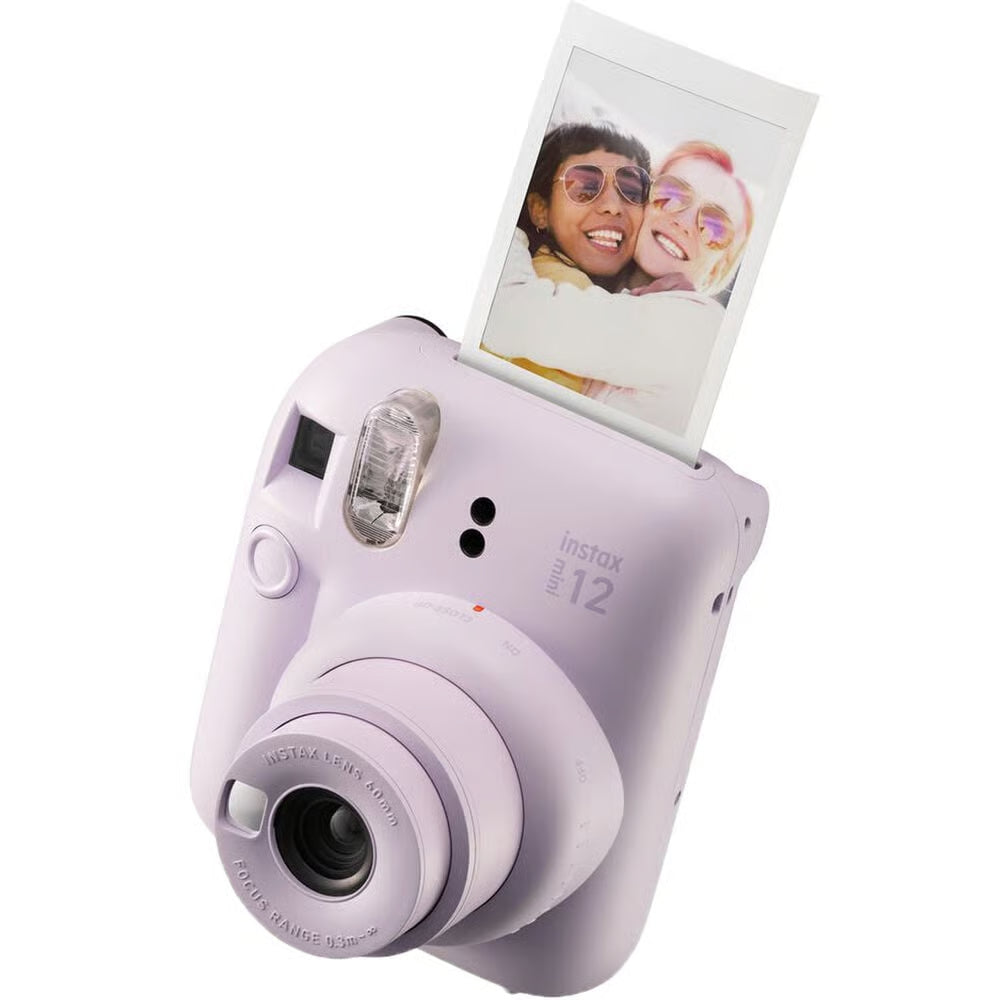 Purple instant camera with a photo on the display against a white background