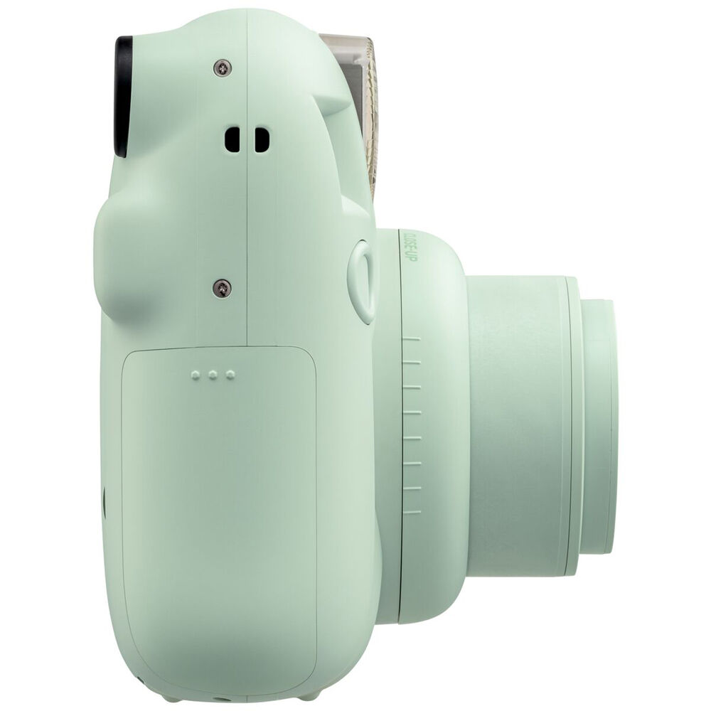 Fujifilm Instax Mini 12 Instant Film Camera Kit in Green including camera with built-in selfie mirror, automatic exposure control, and matching wrist strap.