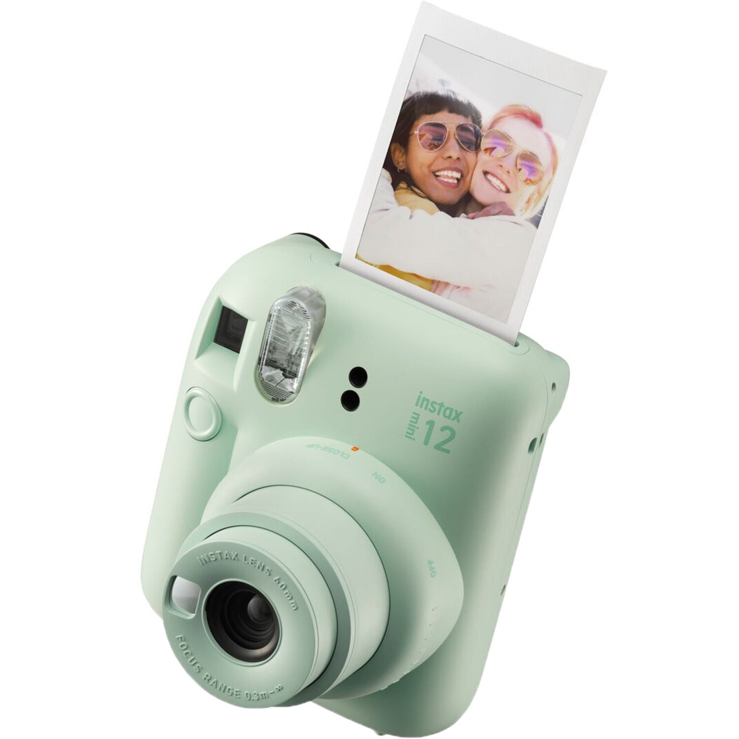 Fujifilm Instax Mini 12 Instant Film Camera Kit in Green including camera with built-in selfie mirror, automatic exposure control, and matching wrist strap.