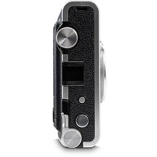 Fujifilm Instax Mini EVO instant camera with lens and film effects.