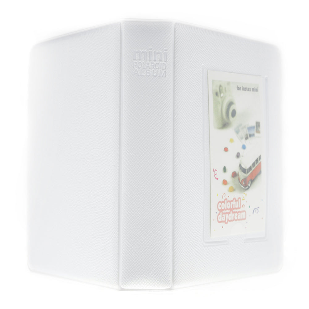 White photo album with a small window on the cover displaying a photo of a vintage camera.