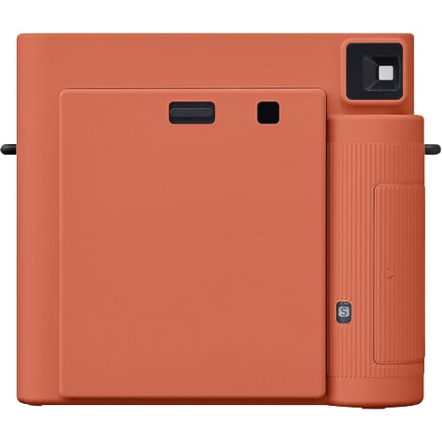 Orange electronic device with a textured side and square camera lens on a white background