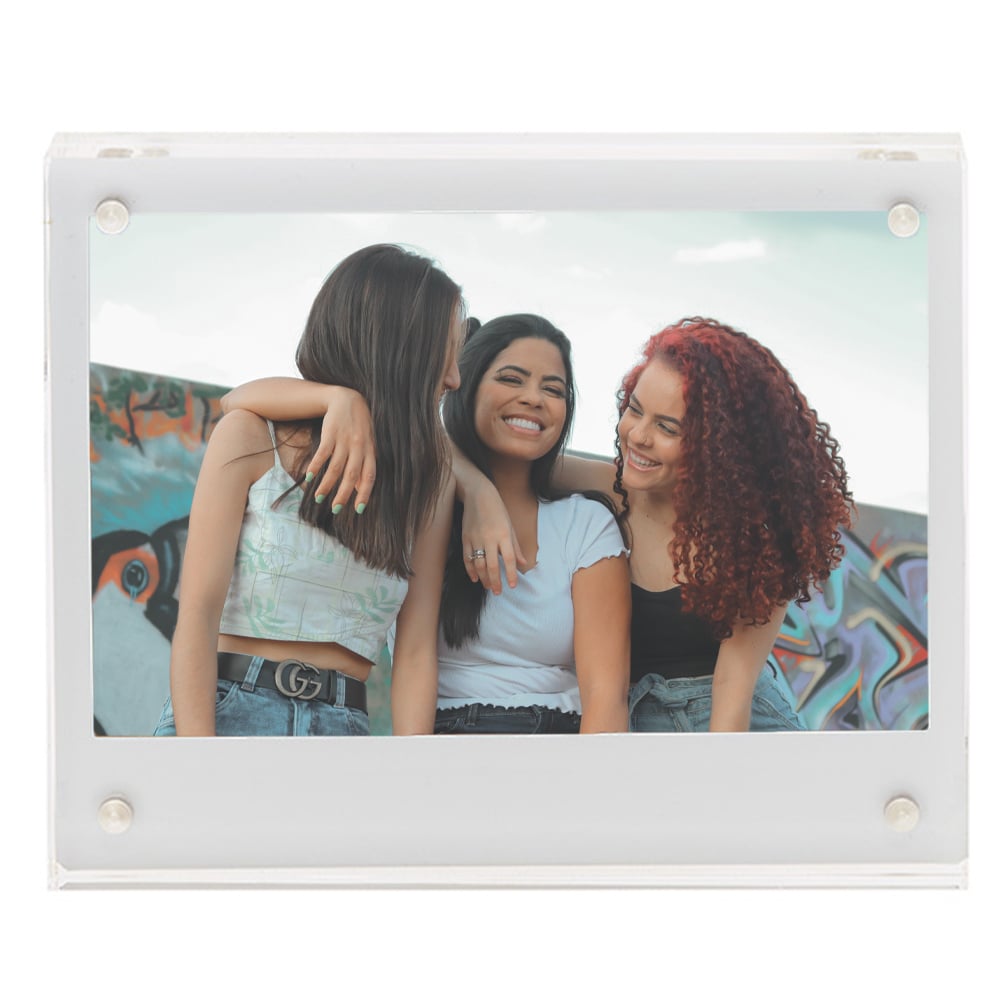 Fujifilm Instax Wide Acrylic Magnetic Frame – clear two-piece acrylic holder with four corner magnets, displaying a wide-format instant photograph and designed for easy sliding insertion on magnetic surfaces.