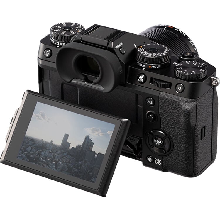 Fujifilm X-T5 silver mirrorless camera with XF 16-50mm f/2.8-4.8 R LM WR lens, 40.2MP APS-C X-Trans CMOS 5 HR sensor, 7-stop in-body image stabilization, 3.69m-dot OLED EVF, and advanced video with 4K 120p and 6.2K 30p recording
