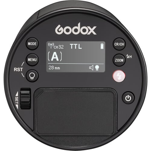 Black Godox device with digital display on a white background