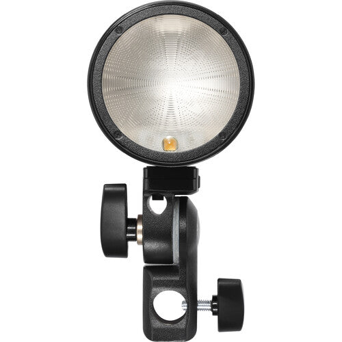 Round light fixture with adjustable arm on a white background