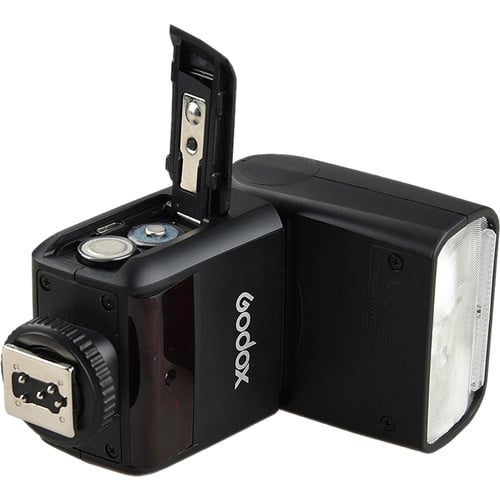 Godox TT350C Mini Thinklite TTL Flash for Canon — compact camera-mounted flash with tilt and swivel head.