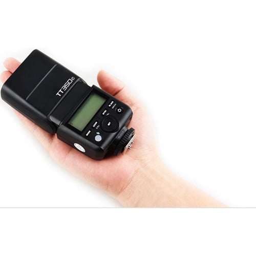 Godox TT350C Mini Thinklite TTL Flash for Canon — compact camera-mounted flash with tilt and swivel head.