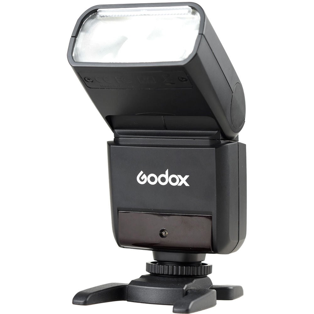 Godox TT350N Mini Thinklite TTL Flash for Nikon, compact lightweight flash with built-in 2.4GHz radio, support for Nikon i-TTL, high-speed sync, 24-105mm zoom, and tilting/rotating flash head.