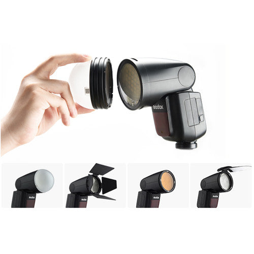Godox V1-F round-head speedlight for Fujifilm — compact flash unit with circular flash head, LCD panel, and removable lithium-ion battery.