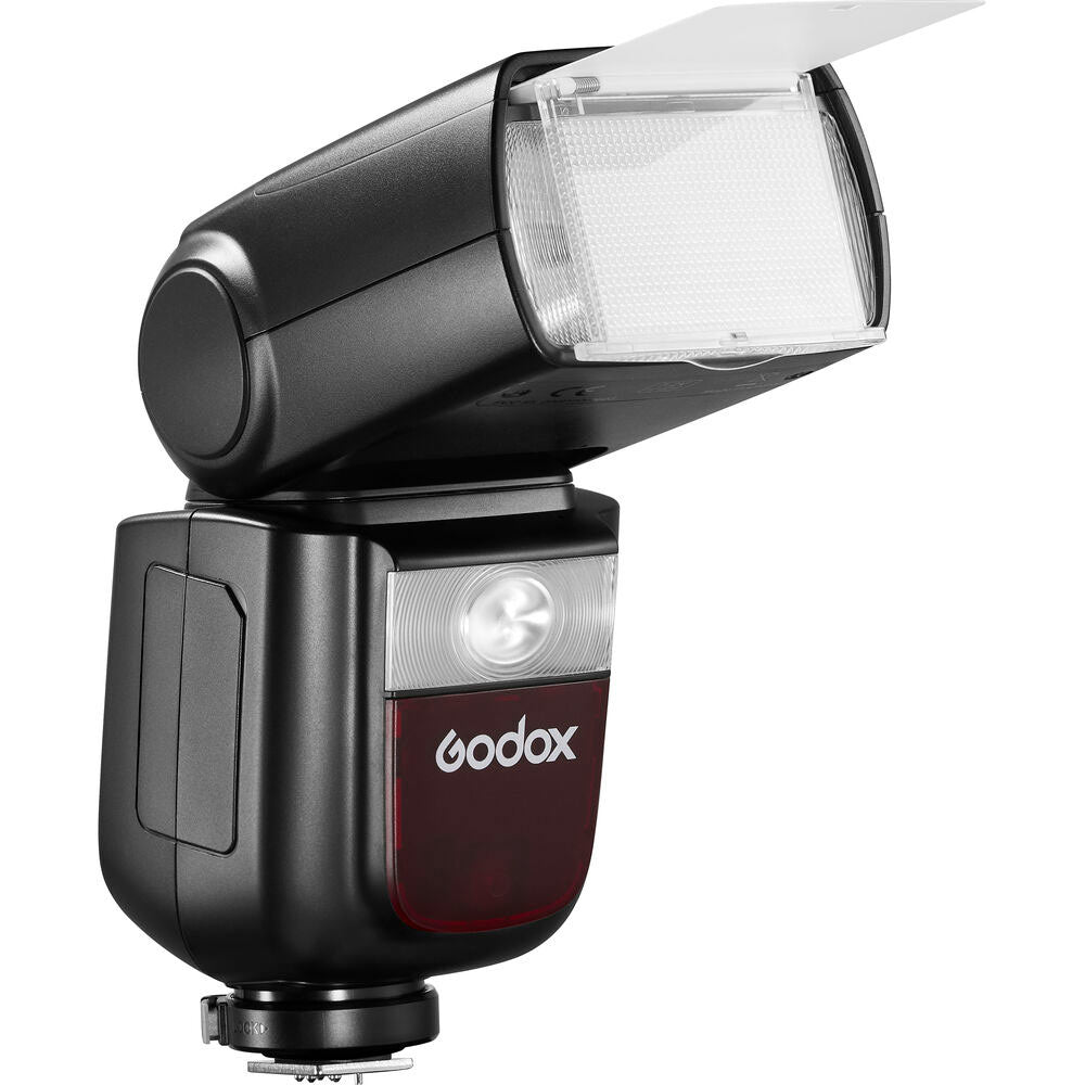 Godox V860 III speedlight for Canon, black flash unit with flip-up head, display panel, removable lithium battery, and accessories.