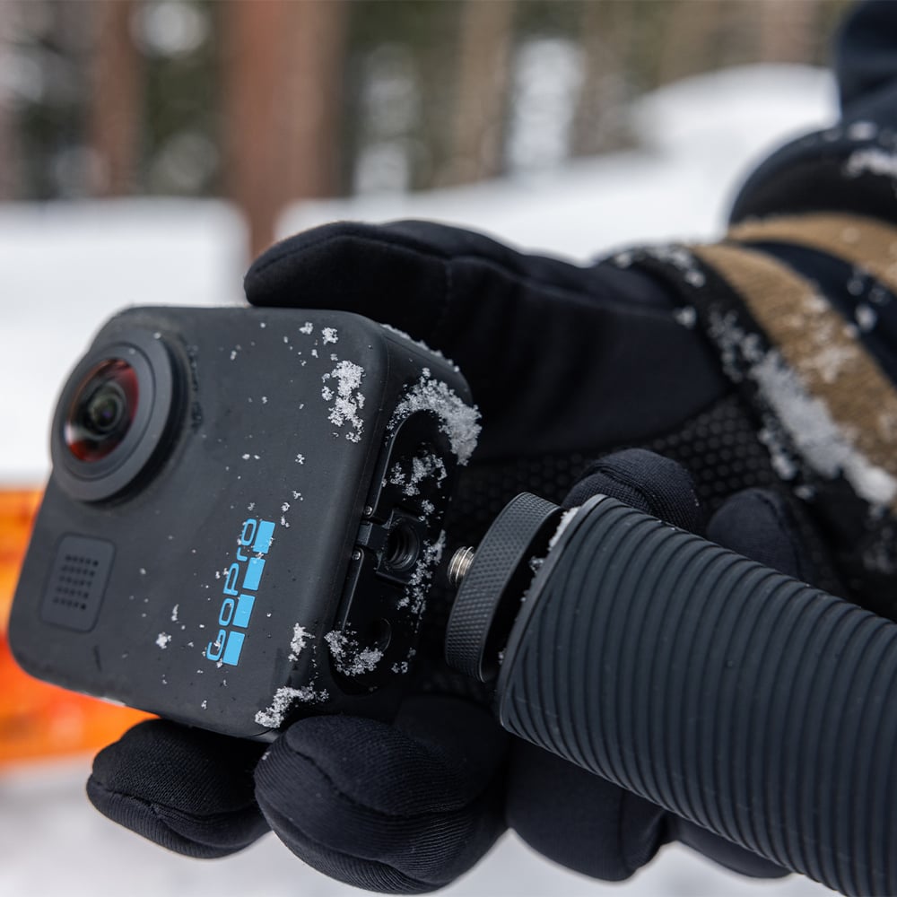 GoPro carbon fiber extension pole extending from 39cm to 2.7m, ultra-lightweight and durable, designed for wide-angle and selfie shots, with secure mounting for all GoPro cameras.