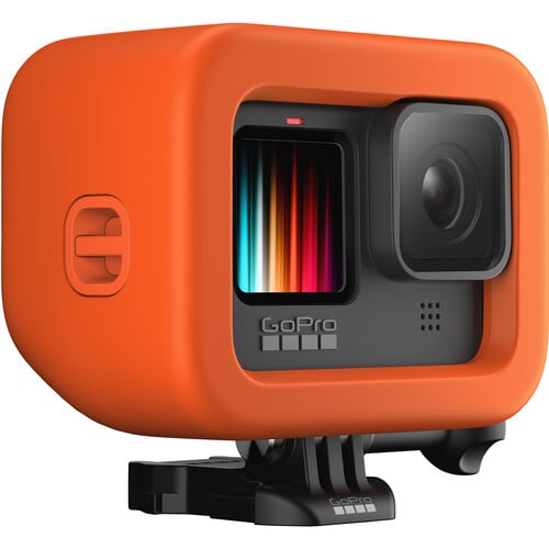 GoPro camera with an orange protective case on a white background
