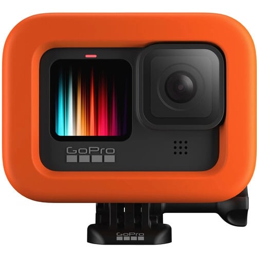 GoPro camera with orange protective case on a white background
