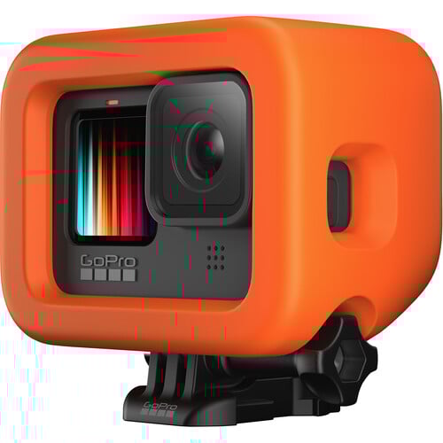 GoPro camera with an orange protective case on a white background