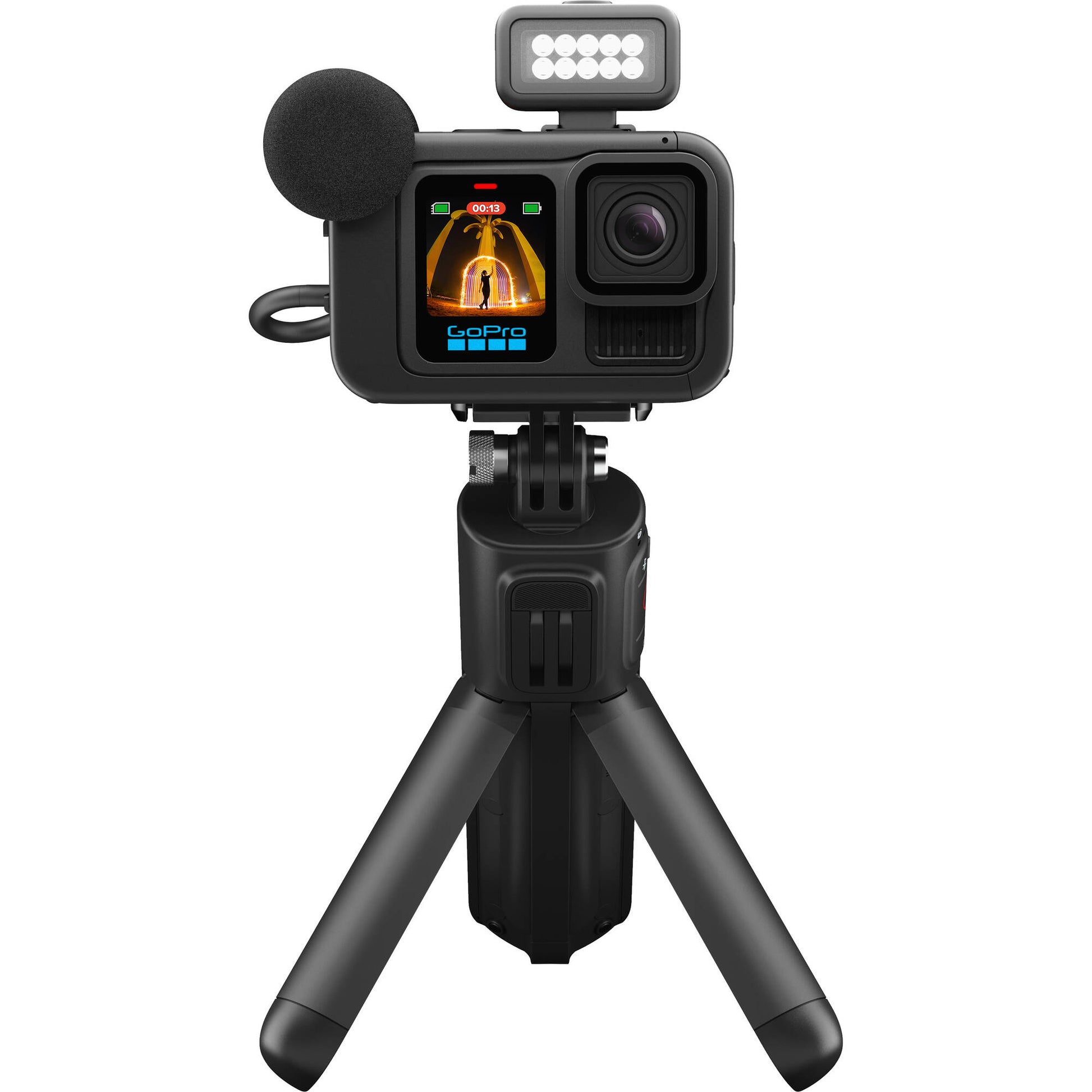 GoPro HERO13 Black Creator Edition bundled kit in black, showing the HERO13 Black camera attached to the Volta battery grip with tripod legs deployed, along with accessories including Media Mod, Light Mod, magnetic latch mount, and carrying case.