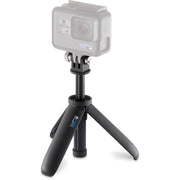 Action camera with a black mini tripod on a white background