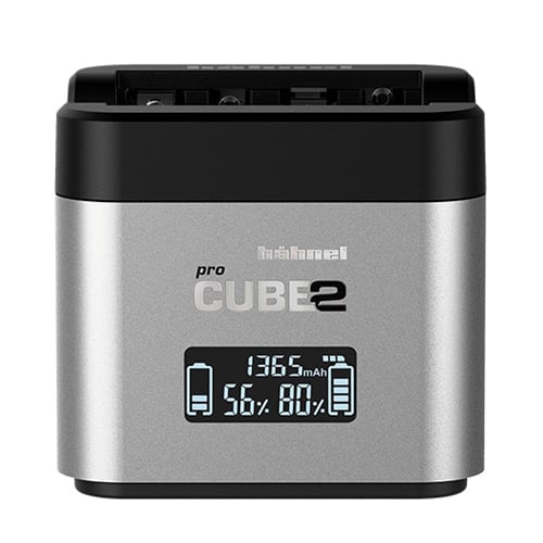 Silver and black battery charger with digital display on a white background